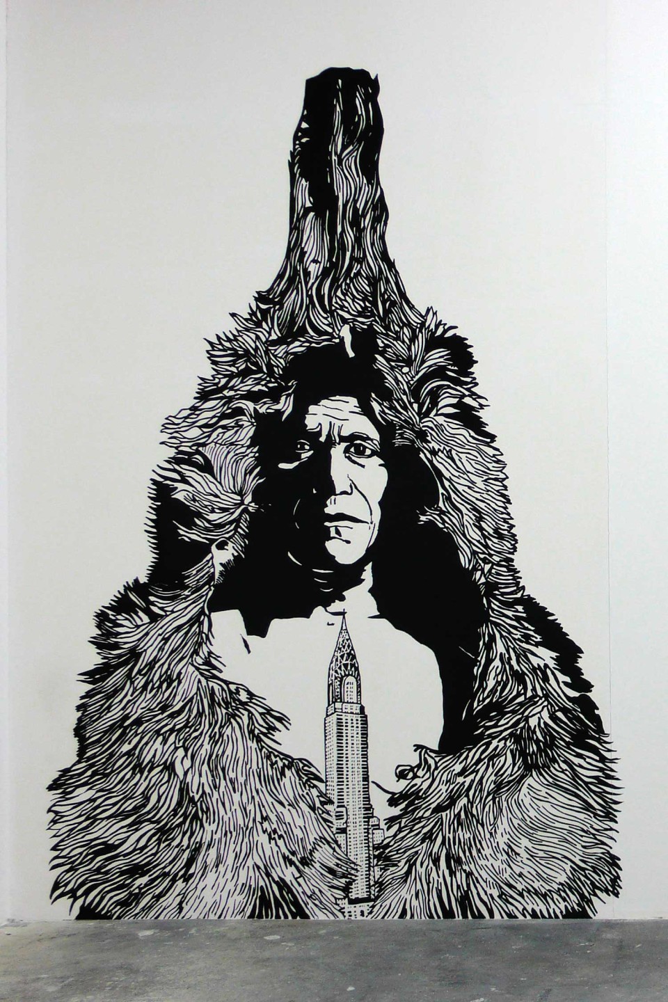 Dessin d'un indien sur mur blanc