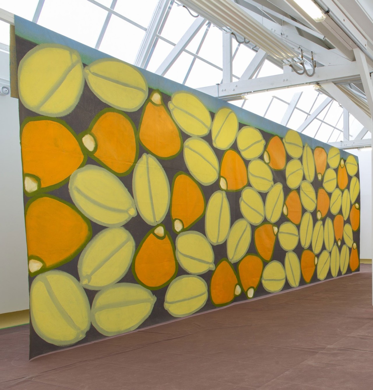 L'oeuvre est une peinture acrylique sur feutre synthétique de 400 centimètres de haut pour 900 centimètres de large. C'est une fresque avec de grosse graines de blés vertes et oranges.