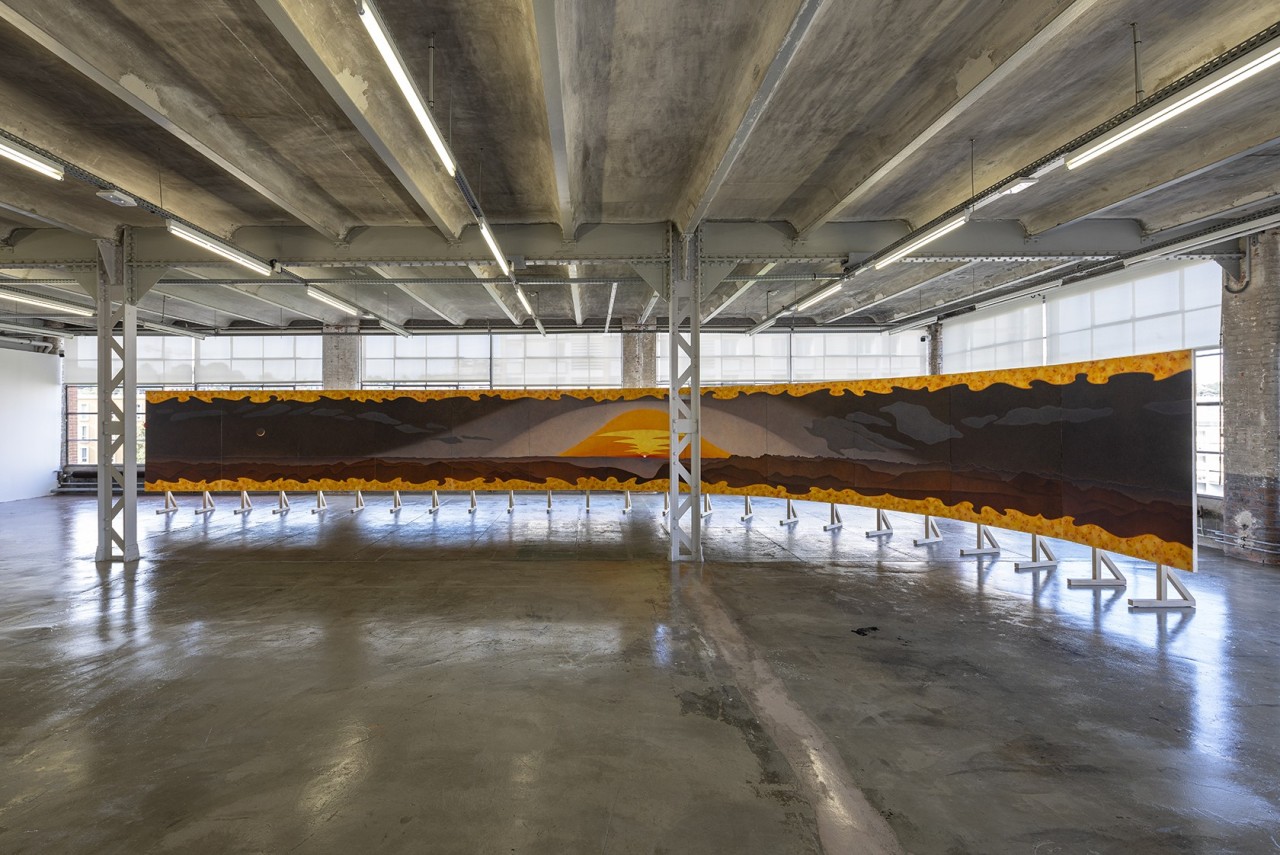 Ensemble de 12 tableaux représentant un lever de soleil sur les Alpes suisses, montés sur une structure autoportante