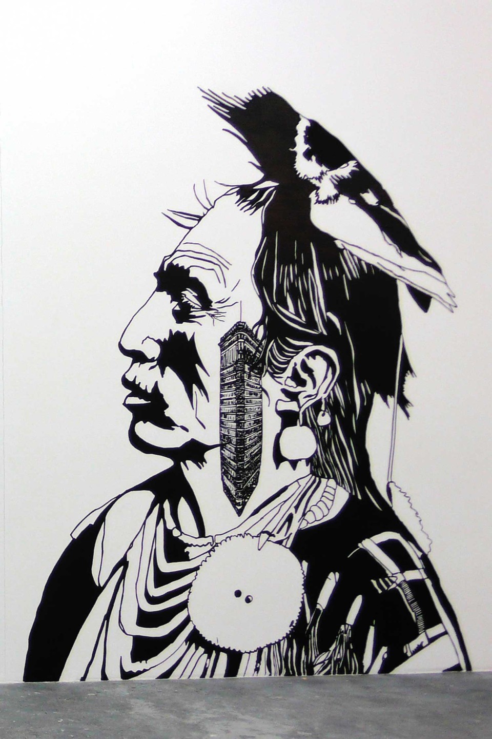 Dessin d'un indien sur mur blanc
